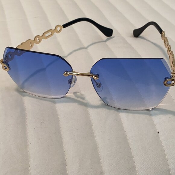 Reverie Futuristic Rimless Diamond Cutting Sunglasses
